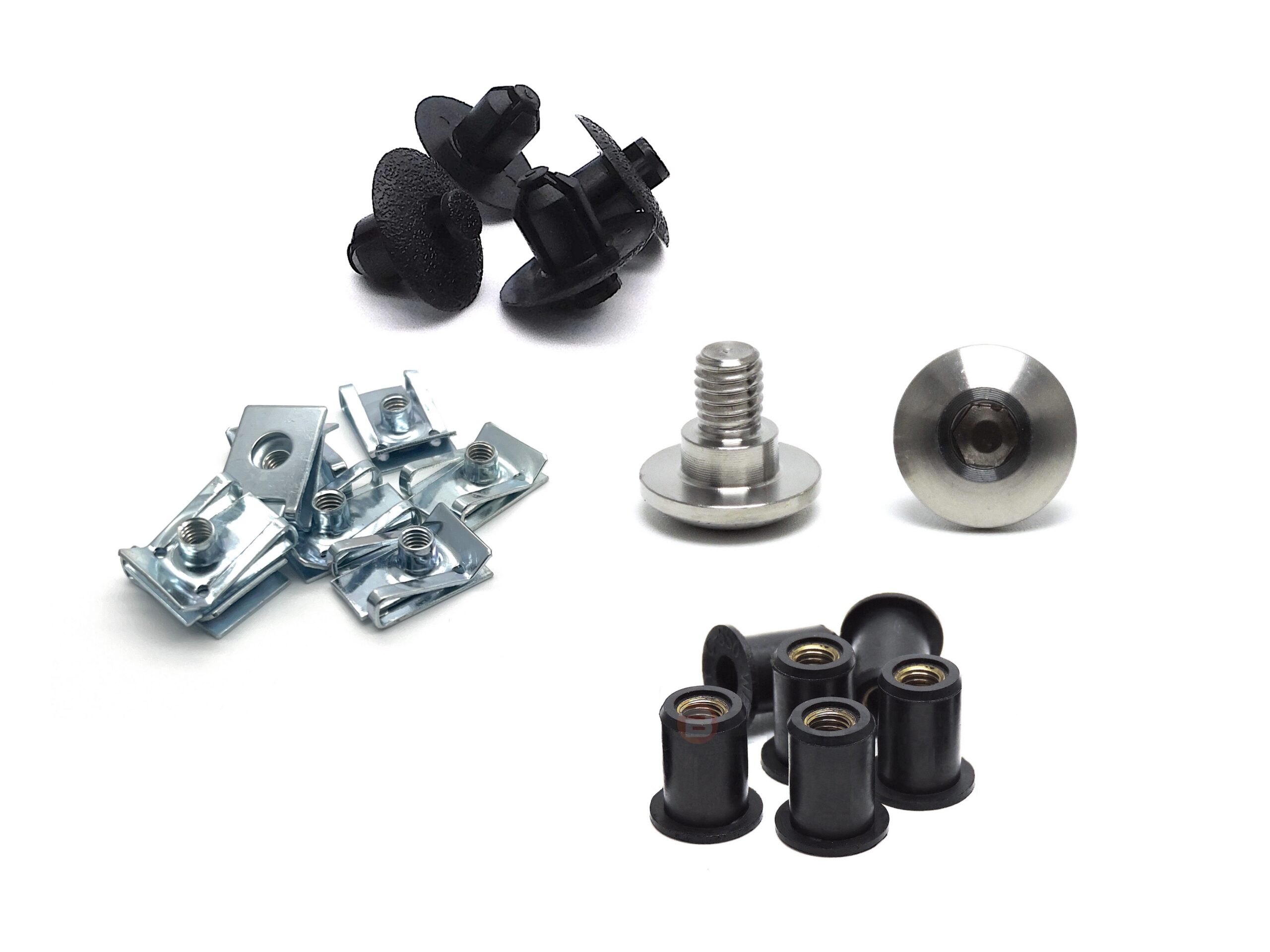 close up of motorcycle fairing bolts , rubber well nuts, metal fairing clips and plastic push clips , 